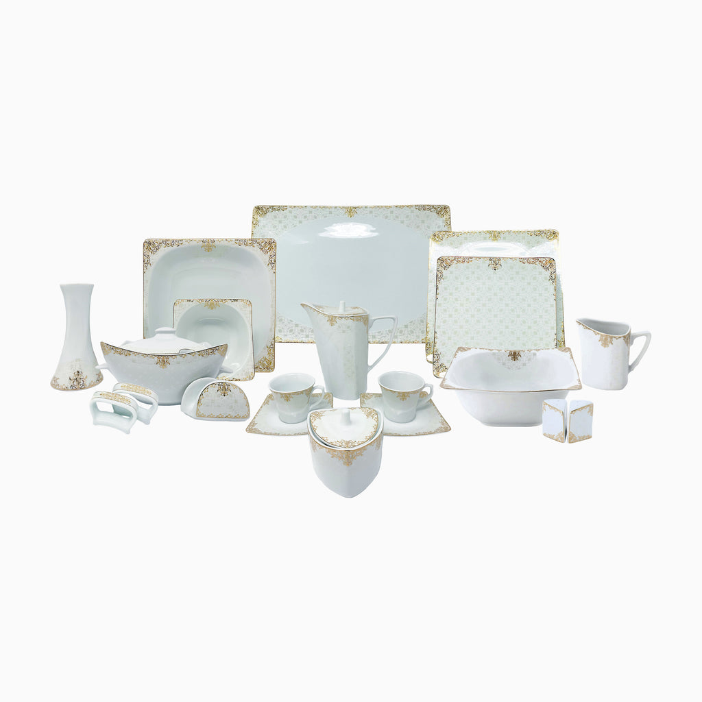 Elegant white porcelain dinnerware set with intricate gold  detailing, designed for refined and luxurious dining experiences. Noble Home Gifts