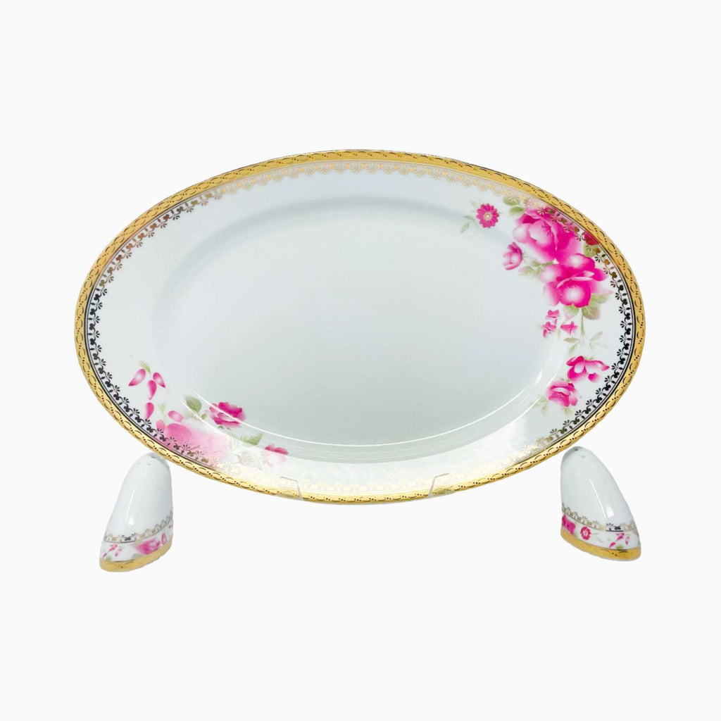 Decorative ceramic plate with floral design on a white background