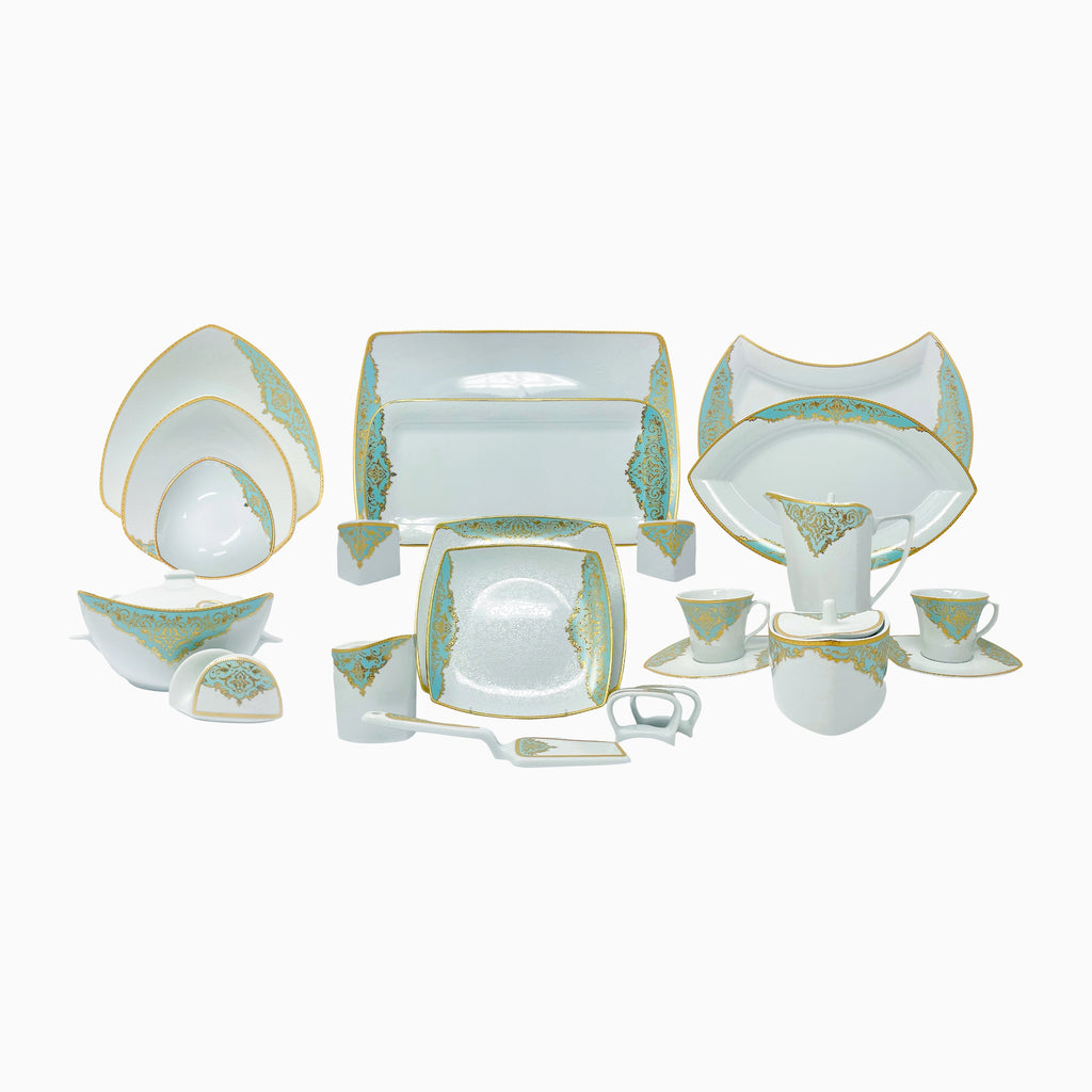 Elegant white porcelain dinnerware set with intricate gold detailing, designed for refined and luxurious dining experiences. Noble Home Gifts