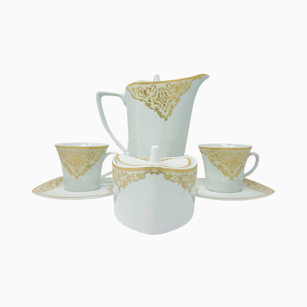 12-PERSON 105 PIECE WHITE AND GOLD DECORATED DINNERWARE SET