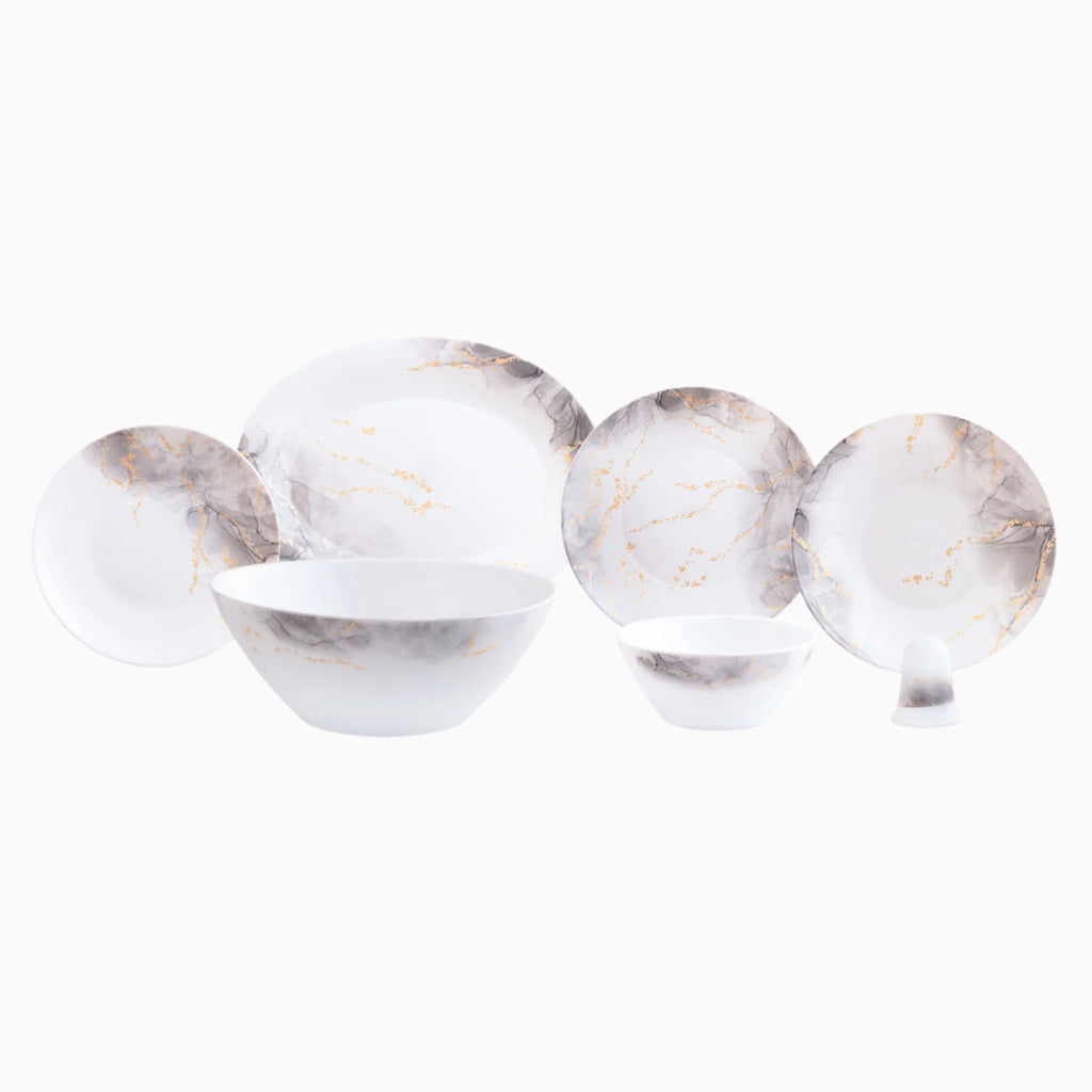 Opal dinnerware set featuring a white base with elegant grey and gold marble design, including plates, bowls, and a shaker. Noble Home Gifts