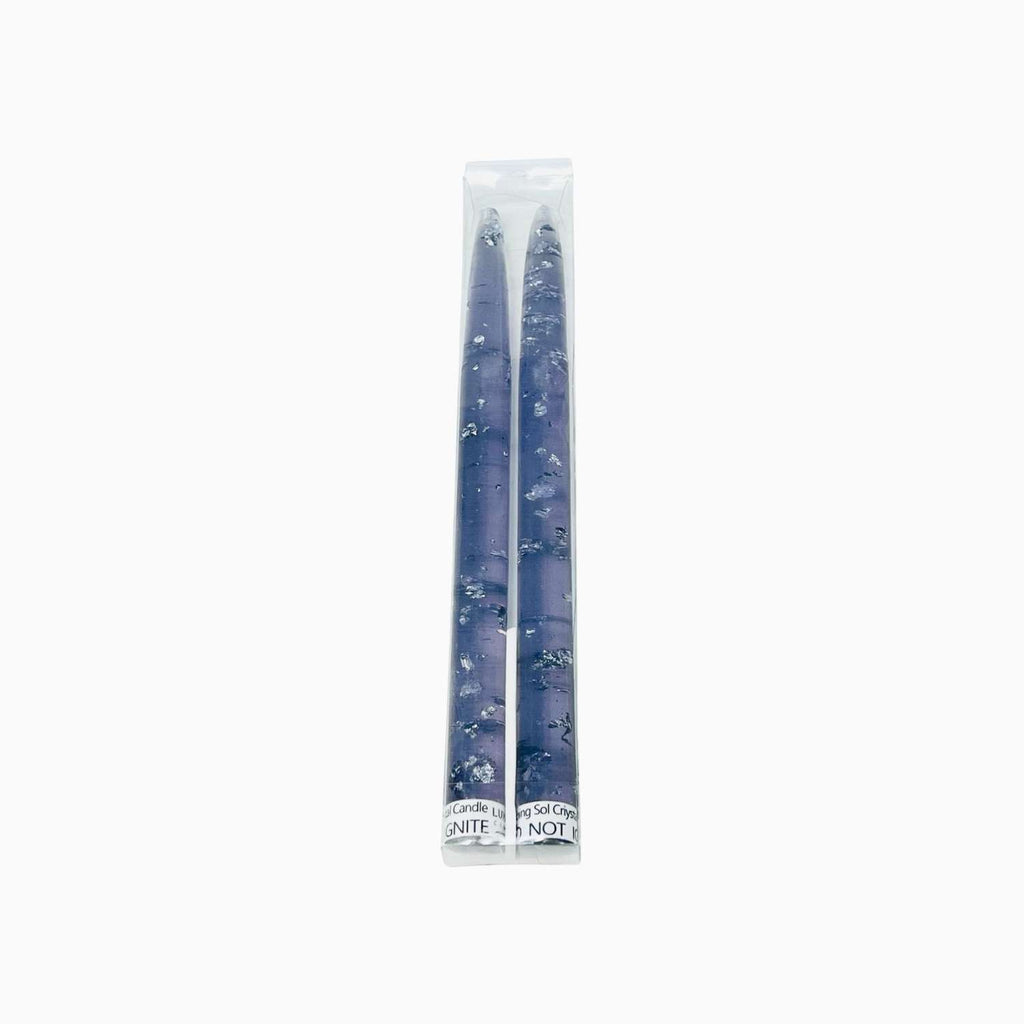 Two blue candles in a clear plastic package on a white background
