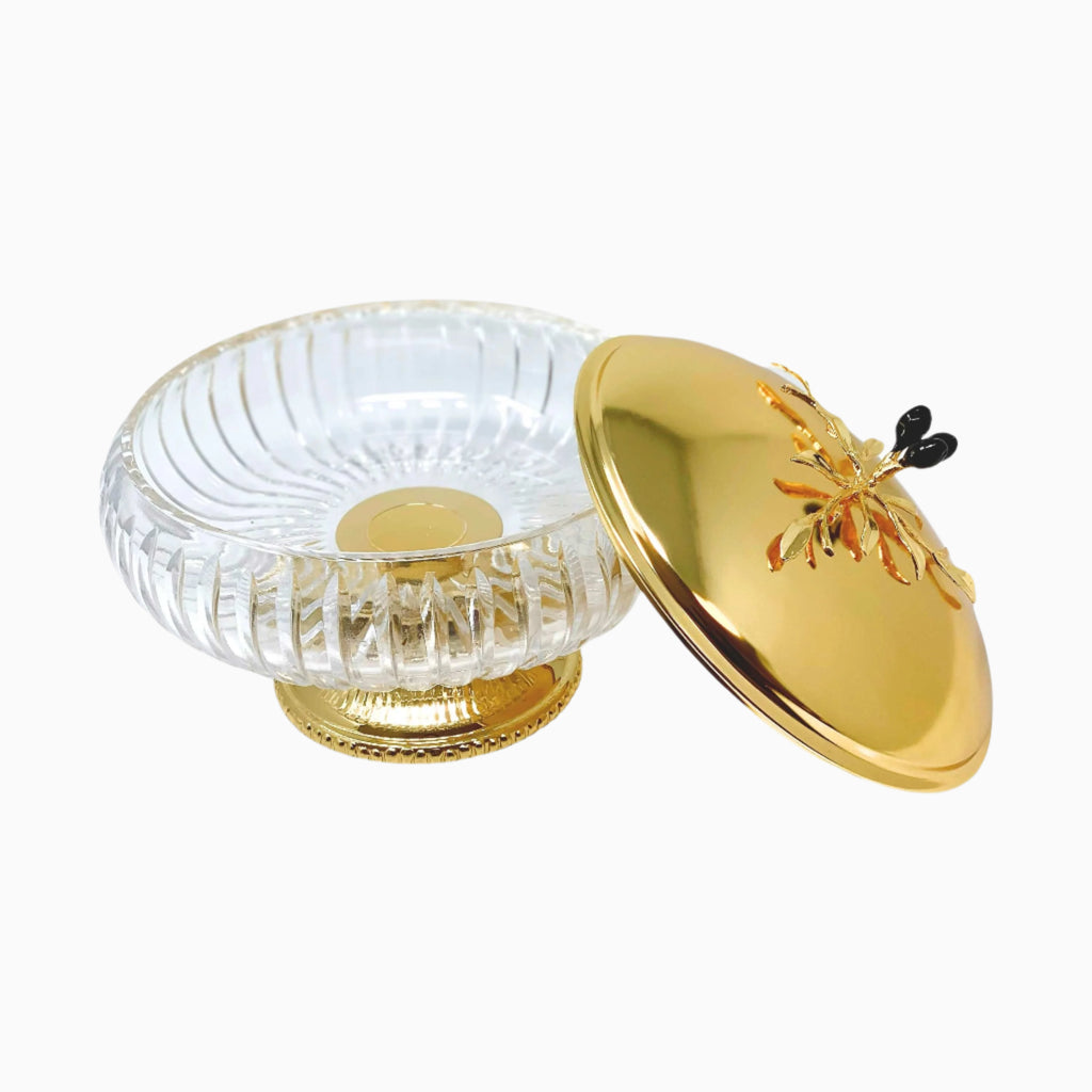 GLASS BOWL ON FOOT WITH GOLD TONE LID