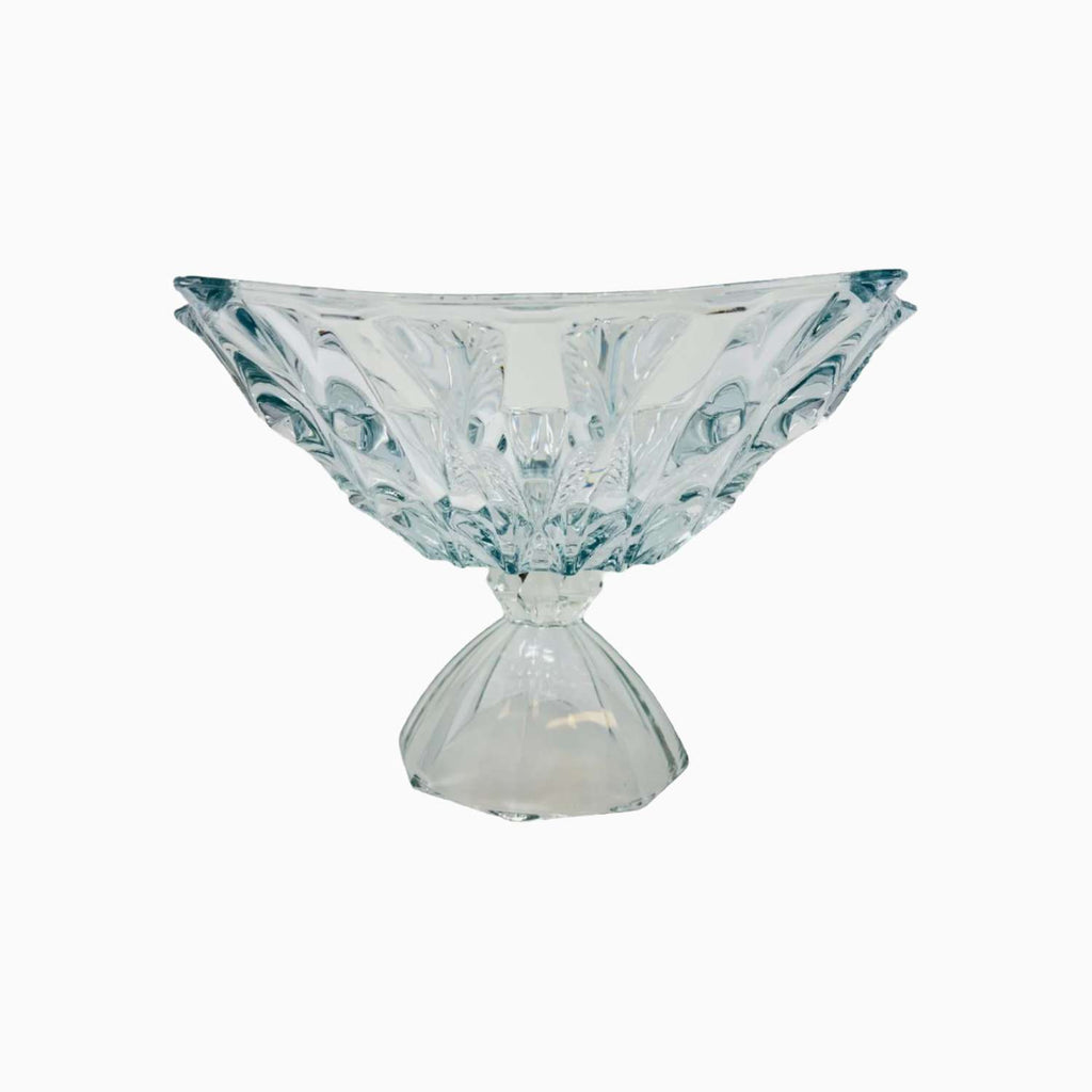 Clear glass bowl with textured design on a white background
