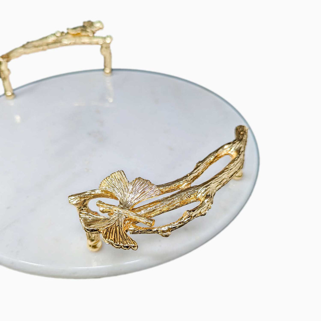 ROUND WHITE MARBLE SERVING TRAY WITH GOLD BUTTERFLY HANDLES