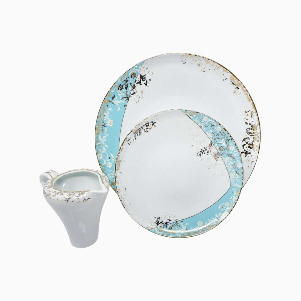 Set of ceramic plates with decorative blue and white design on a white background