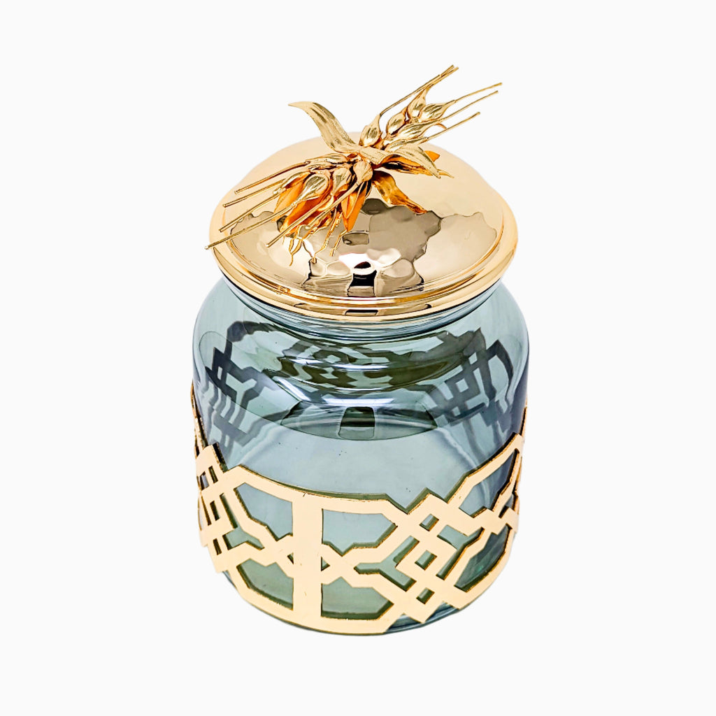 CLEAR JAR WITH GOLD FLOWER LID