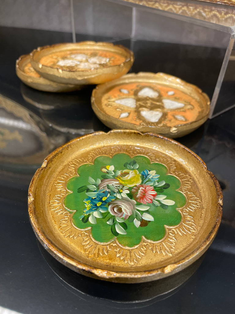 A close-up of an elegant Italian wood tray with intricate details. The tray is perfect for serving food or displaying decorative items.