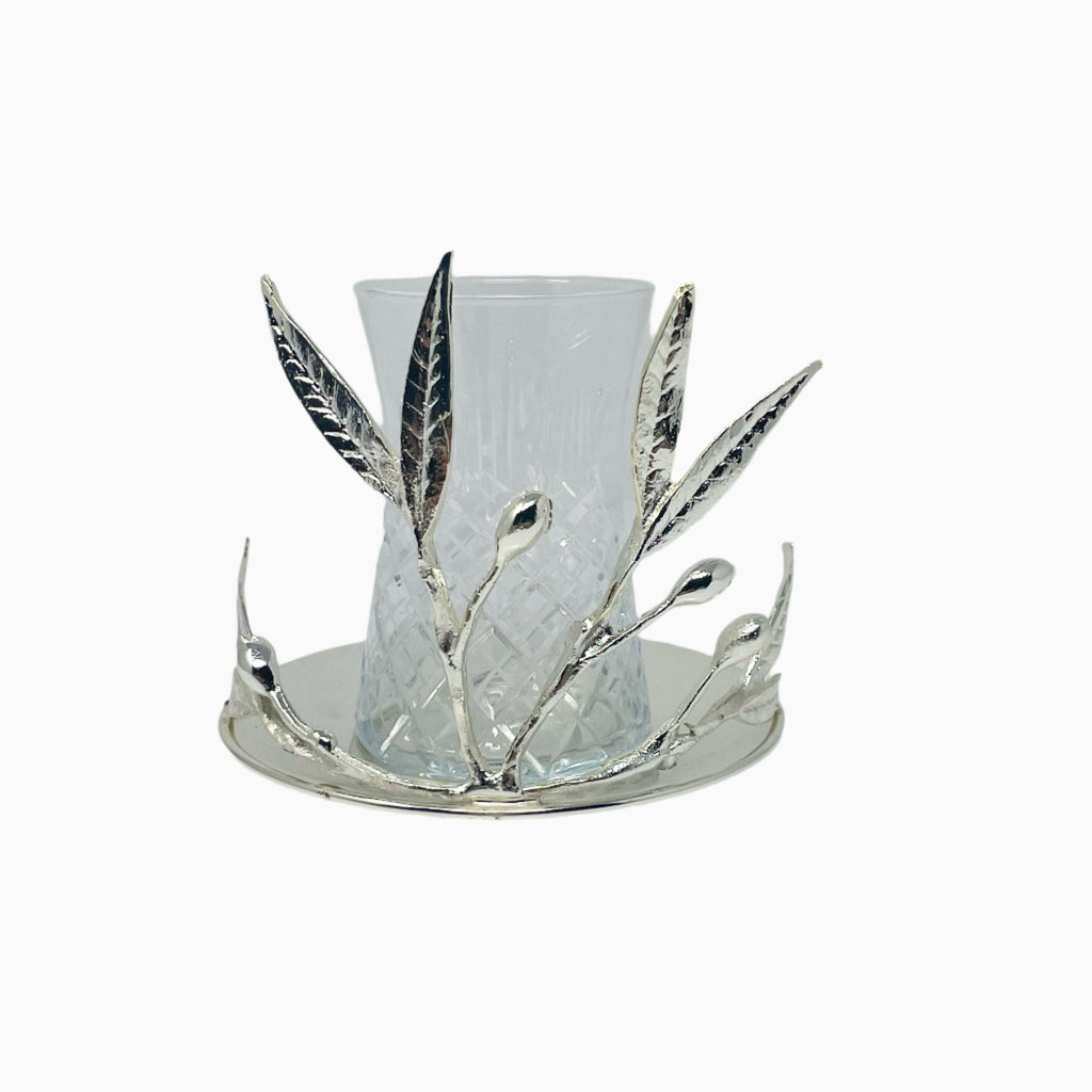 GLASS TEA CUP ON SAUCER