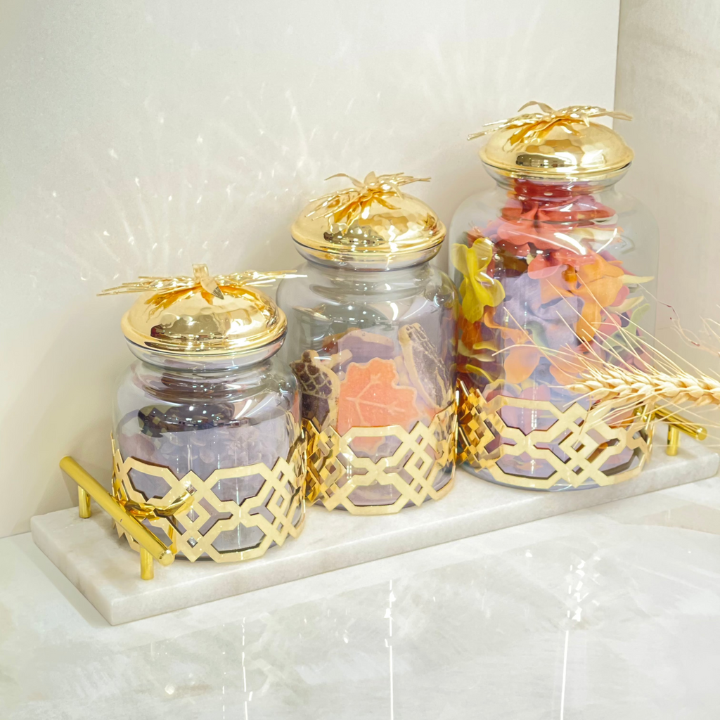LARGE CLEAR JAR WITH GOLD FLOWER LID