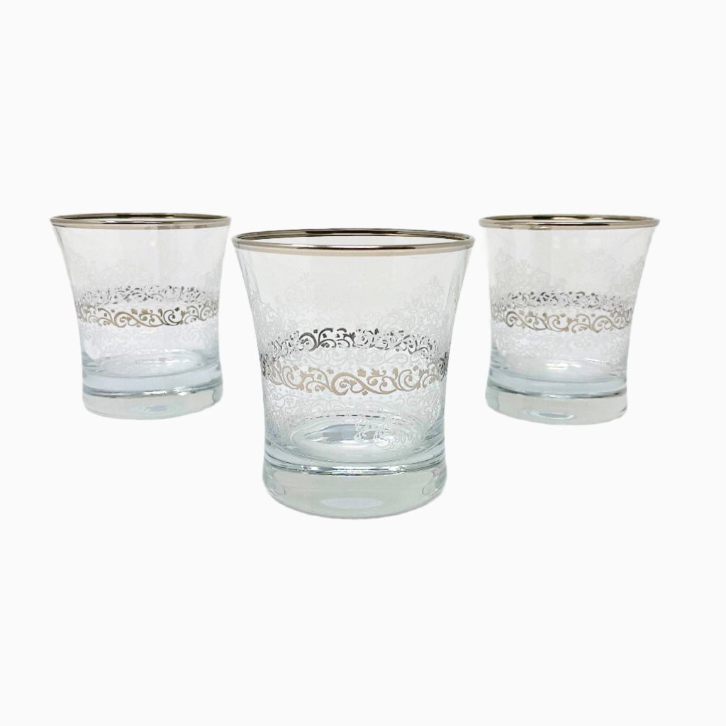 SIX-PIECE SILVER DECORATED DRINKING GLASS