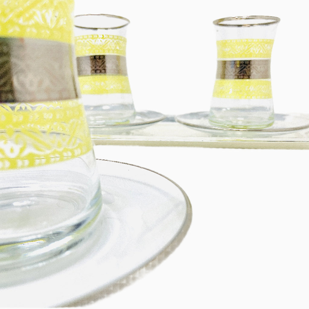 YELLOW AND GOLD DECORATED SIX PERSON TEA SET